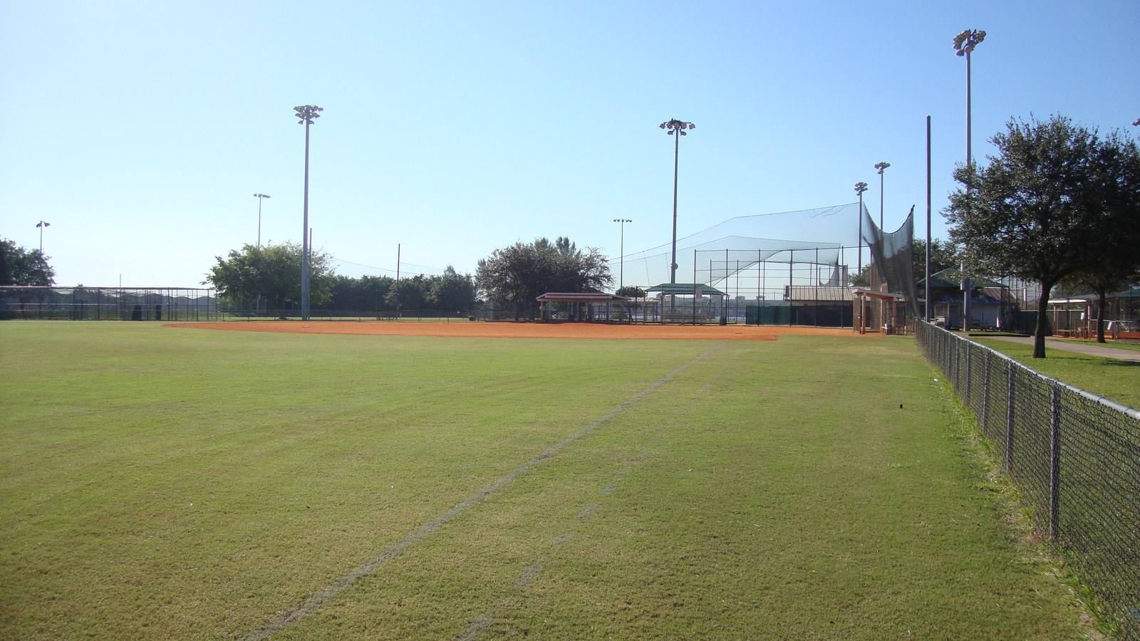 Pembroke Shores Park baseball fields, covered dugout, and open green space in Pembroke Pines, Florida