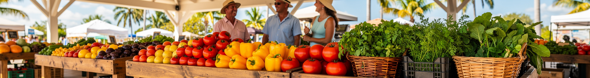 Produce stalls and fresh local produce at a farmers market with palm trees — artisan market atmosphere